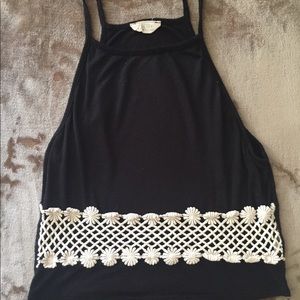 black tank top with seashells